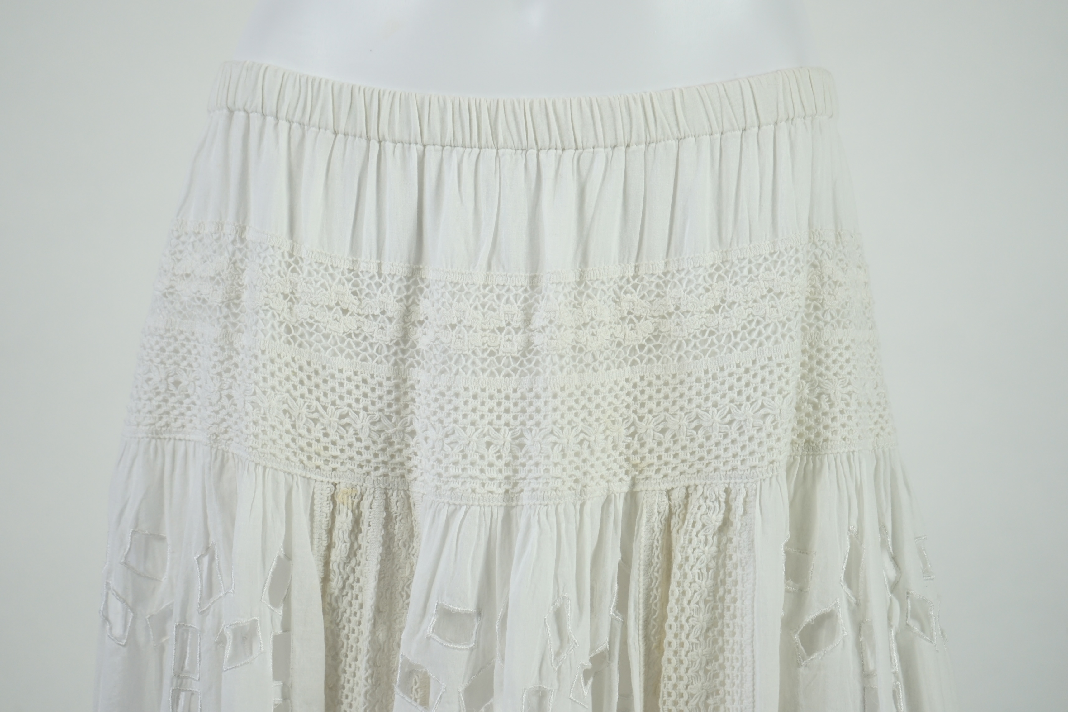 Two Michael Kors white midi length skirts and a white blouse. Size 14 - 16 Proceeds to Happy Paws Puppy Rescue